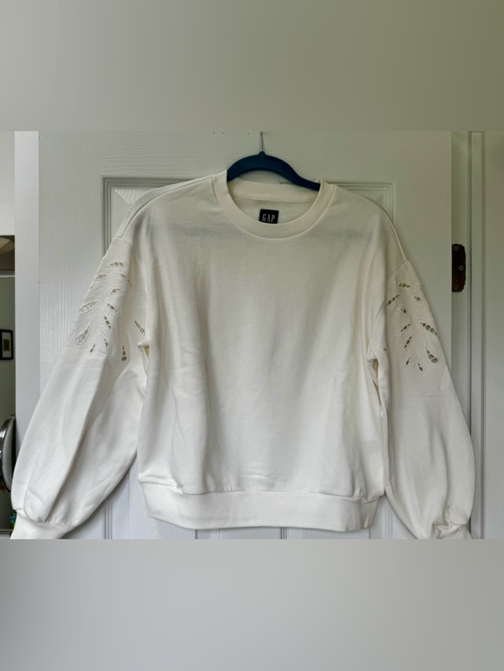 GAP Petite Crewneck Sweatshirt in Off-White with pretty cut outs on the sleeves.